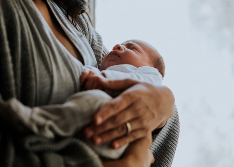 1800x1200 woman holding baby other – TodayHeadline