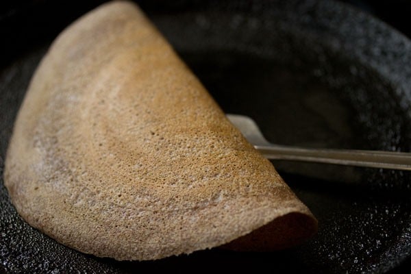 ragi dosa folded and ready to be served.