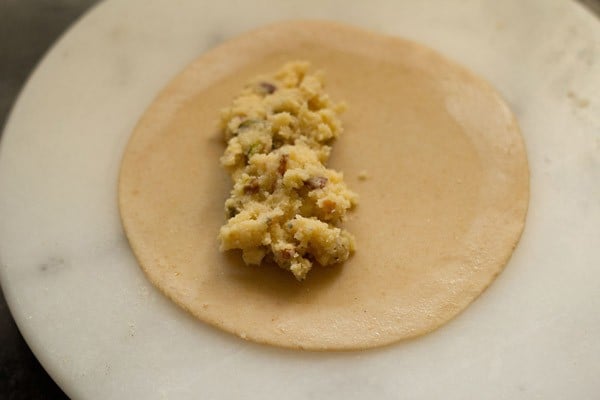 stuffing on one side of the rolled dough