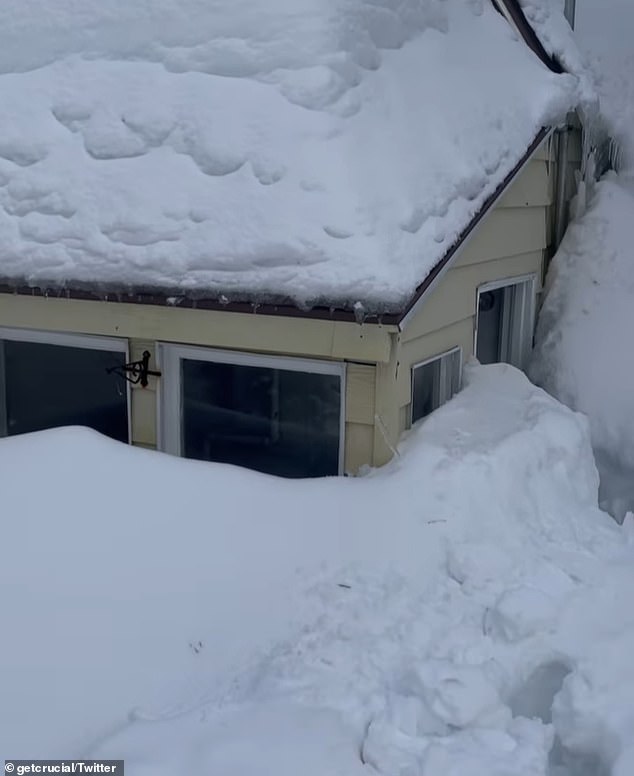 Many homes are snowed in as feet of snow blocks them in