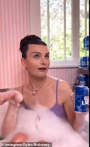 In one bizarre portion of the video she was seen in the bath with a beer