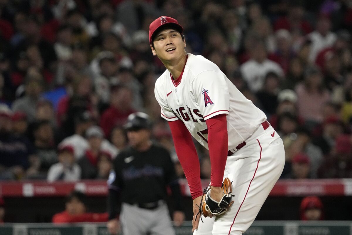 Angels starting pitcher Shohei Ohtani reacts after a ball was called on one of his pitches.