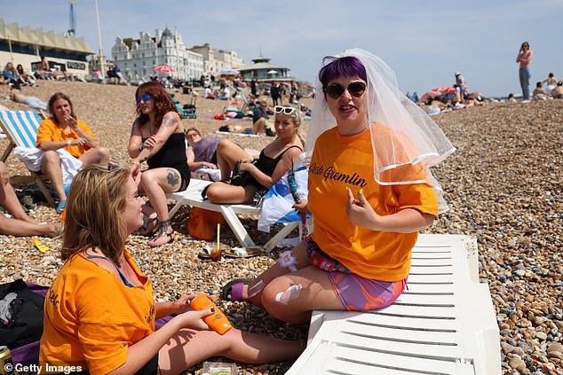BRIGHTON: A group of ladies made the most of the warm weather as they took their hen do to the beach