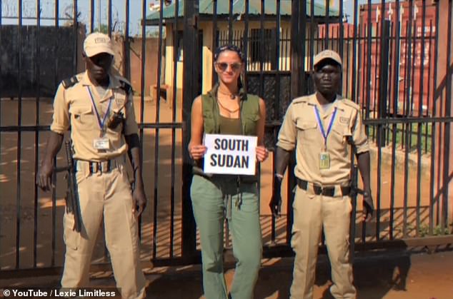 Lexie with security guards in South Sudan. She says that ¿some of the reasons to travel there as a tourist would be to see its unique tribal cultures and a few national parks scattered throughout the country¿