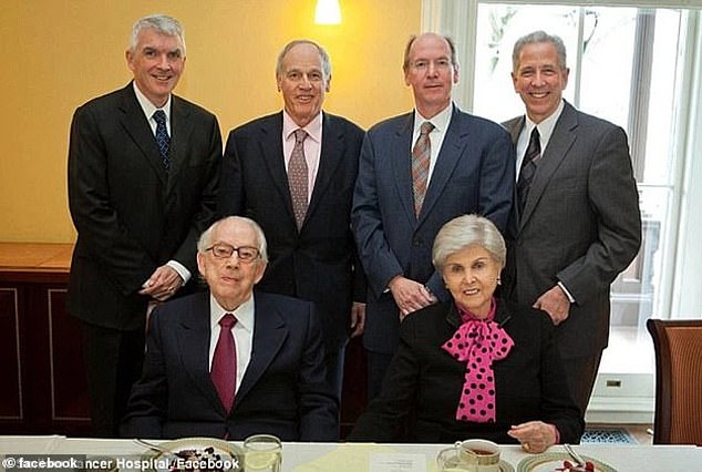 The Sacklers have been given immunity from civil lawsuits over their role in the opioid crisis. Dr Richard Sackler, standing second from left and Jonathan Sackler standing second from right. Seated is co-founder Raymond and his wife Beverly Sackler