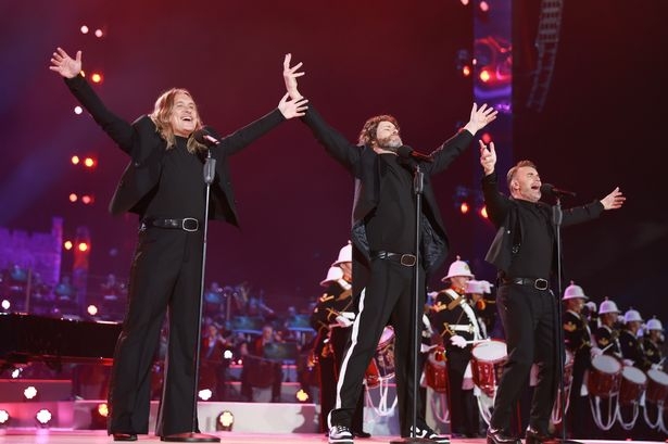 Take That fans complain about same issue as 'fourth member' introduced to the stage at Coronation Concert