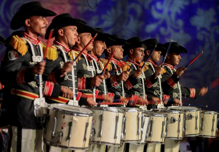 Egyptian drummers in uniform stand in a line and play at a festival in Cairo, Egypt - Saturday 27 May 2023