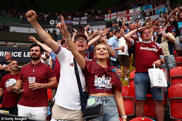 West Ham Fans showed their support as they cheered from the stands ahead of the game