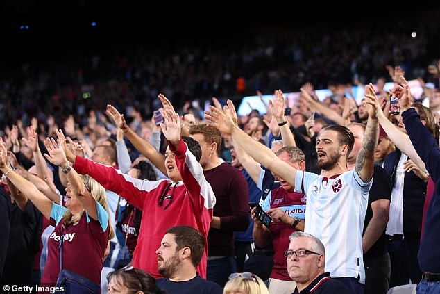West Ham fans look on during a match against Leicester City in August 2021, when they smashed the 2016 surprise winners 4-1