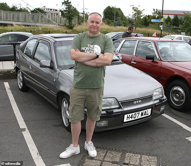 Mark Jones, 52, from Ruislip, Middlesex is pictured beside his immaculate 1989 Astra GTE. He said he is not willing to pay the Ulez charge so his car may be sold to another enthusiast from outside the M25 or locked in his garage until it reaches 40 and becomes Ulez compliant