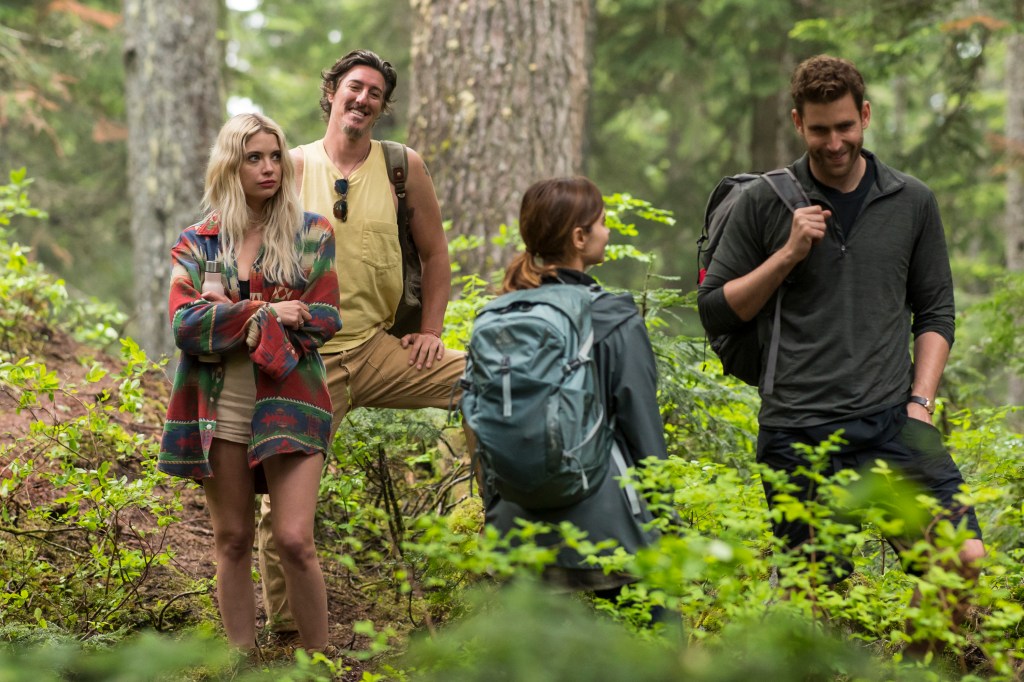  Ashley Benson as Cara, Eric Balfour as Garth, Jenna Coleman as Liv Taylor, and Oliver Jackson-Cohen as Will Taylor hiking together. 
