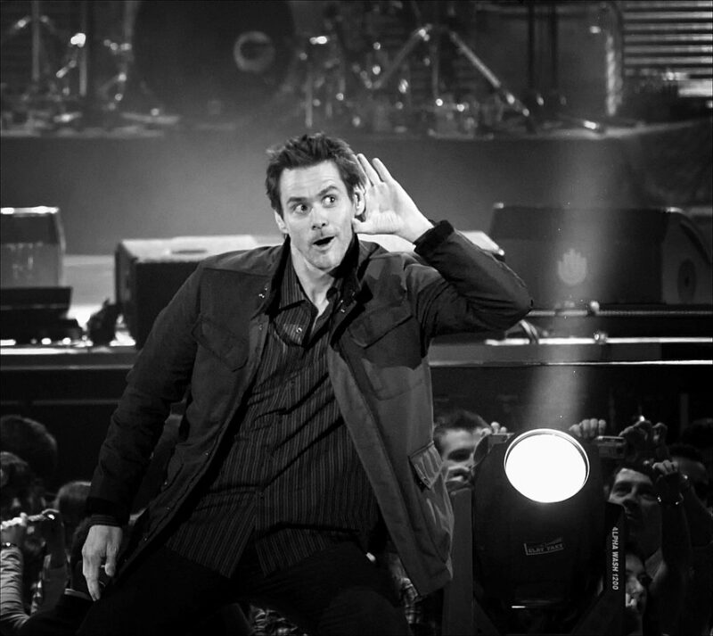Jim Carrey performing on stage in Spain in 2008