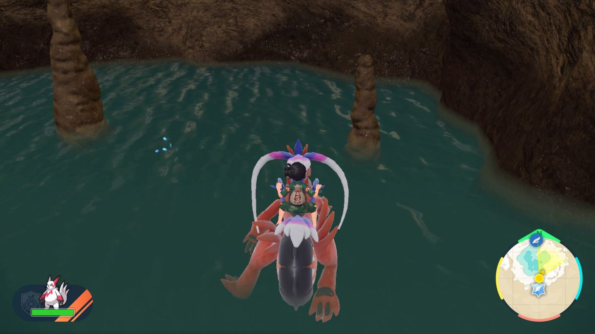 A sweating Feebas approaches the water’s surface in Pokémon Scarlet and Violet: The Teal Mask
