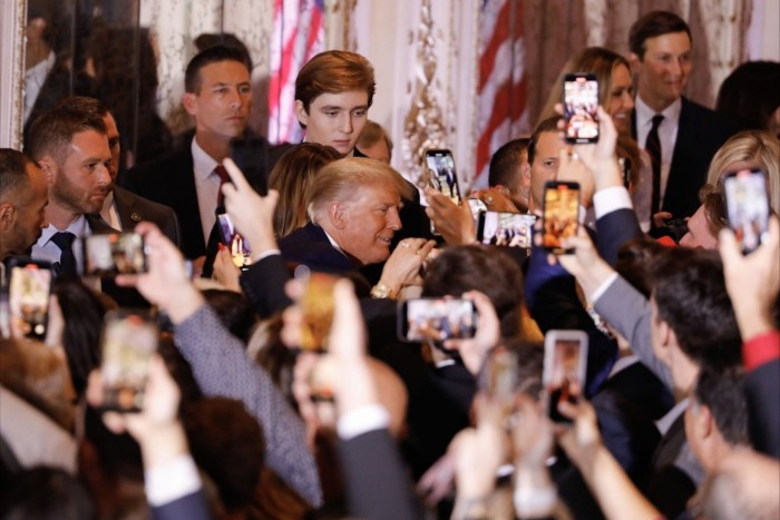 Donald Trump, centre, greets attendees at a 2022 event at the Mar-a-Lago Club 