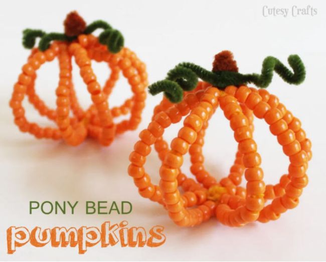 Pumpkins made of pipe cleaners and orange plastic beads (Halloween Activities)