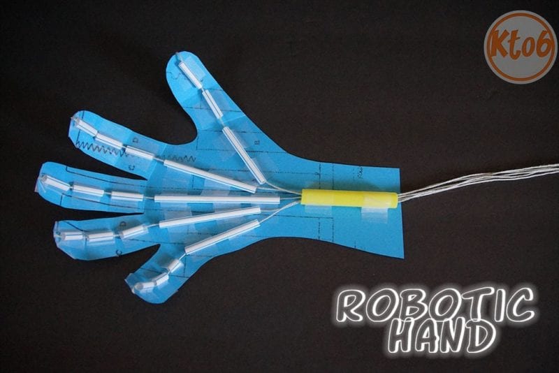 Robot hand built from drinking straws, string, and paper (Halloween Activities)