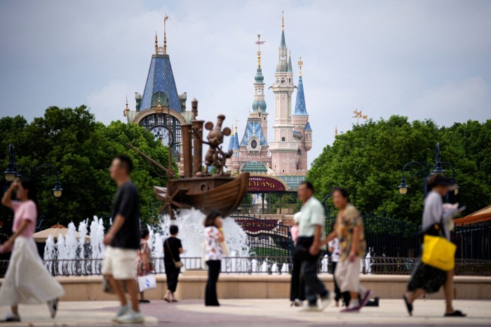People visit Shanghai Disney Resort during a media preview of the world’s first Zootopia-themed land