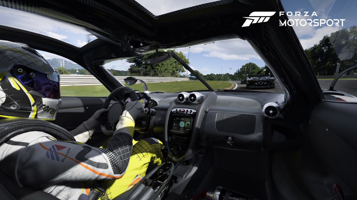 A driver sits in the cockpit of a luxury sports car, chasing another car in Forza Motorsport
