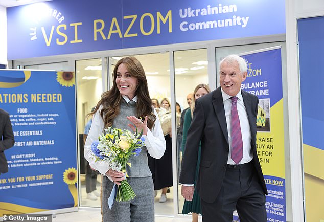 As she left the Vsi Razom Community Hub, Kate smiled while carrying her flowers