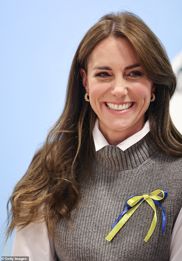 After trying her hand at making bow badges using ribbons in the colours of the Ukrainian flag, Kate proudly displayed one on her chest