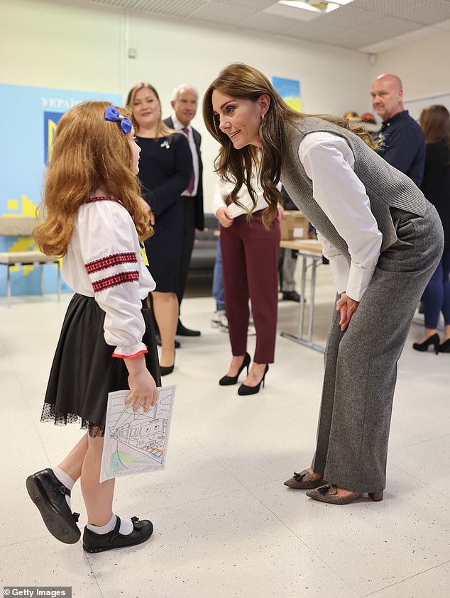 The sweet little girl looked a little bashful as she met the real-life princess, but Kate proved once again she has a natural affinity with children