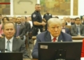 Trump sitting at the defense table during his New York fraud trial.