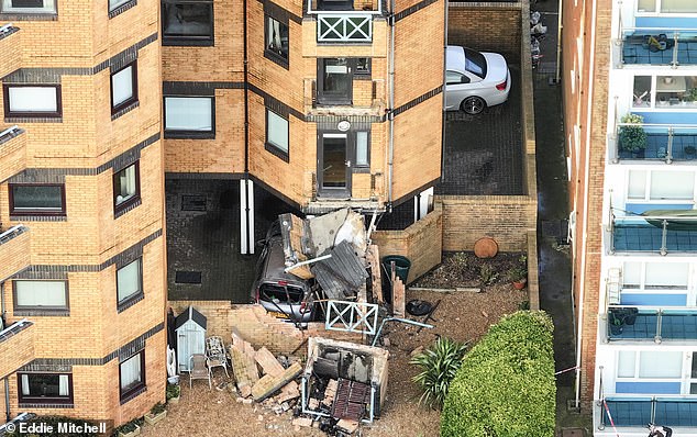 Two balconies have collapsed and crushed a car at a residential block as shaken residents were having an early Christmas celebration