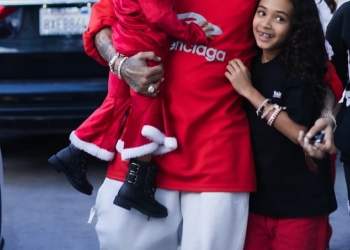 Chris Brown wraps his arms around daughters Royalty 9 and jpg