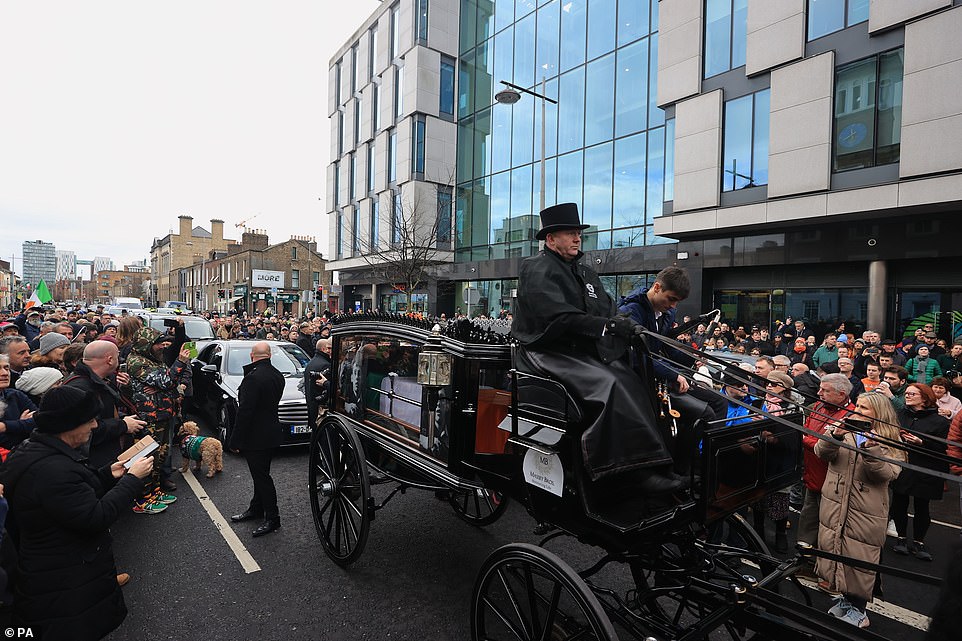 Thousands of well-wishers took to the streets honour the Pogues frontman