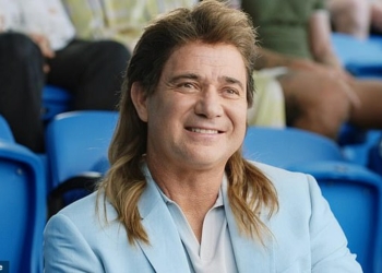 Andre Agassi pays tribute to his famous mullet as he jpg