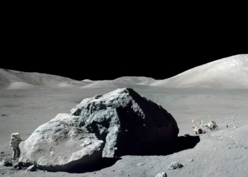 NASA Apollo 17 Astronaut Next to Huge Lunar Boulder scaled jpg