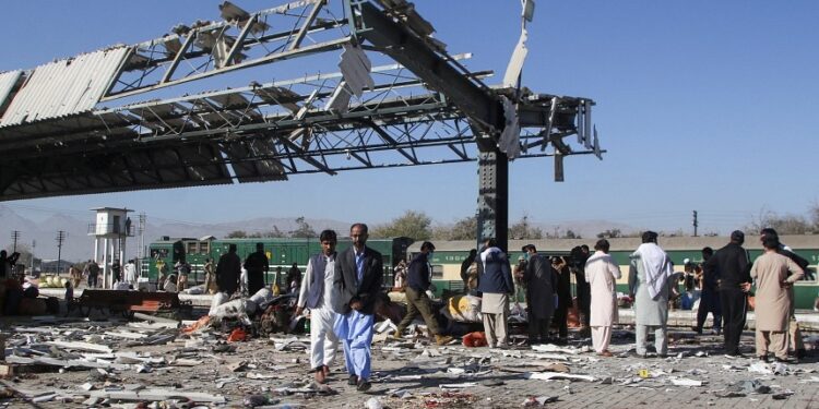 At least 24 killed in Pakistan train station bomb blast, police say