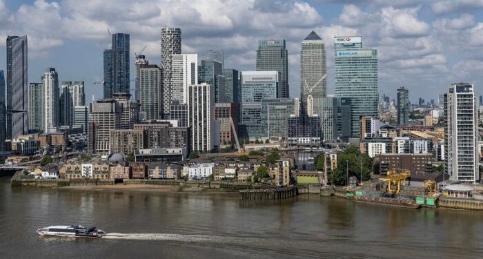 The Canary Wharf business district and the river Thames