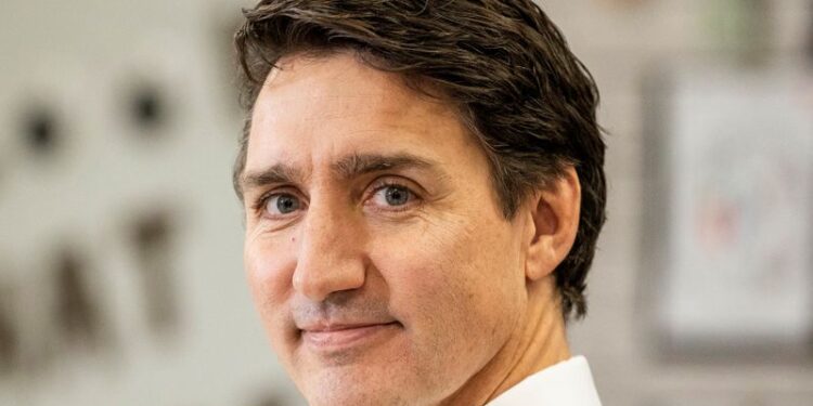 © Reuters. FILE PHOTO: Canada's Prime Minister Justin Trudeau looks on, on the day he makes an announcement at Aylesbury Public School in Brampton, Ontario, Canada, November 22, 2024. REUTERS/Carlos Osorio/ File Photo