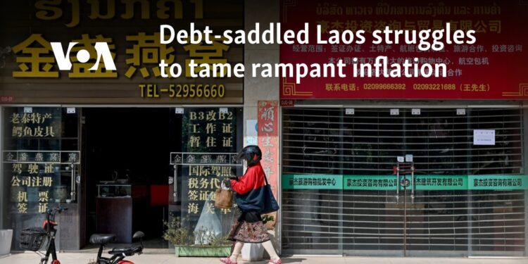 Debt-saddled Laos struggles to tame rampant inflation