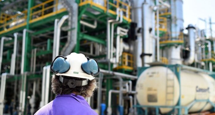 A technician works at the Matrica chemistry complex in Porto Torres, Sardinia