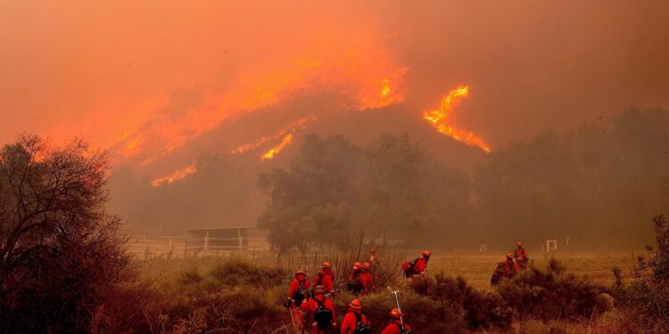 Fire crews gain greater control over destructive Southern California wildfire