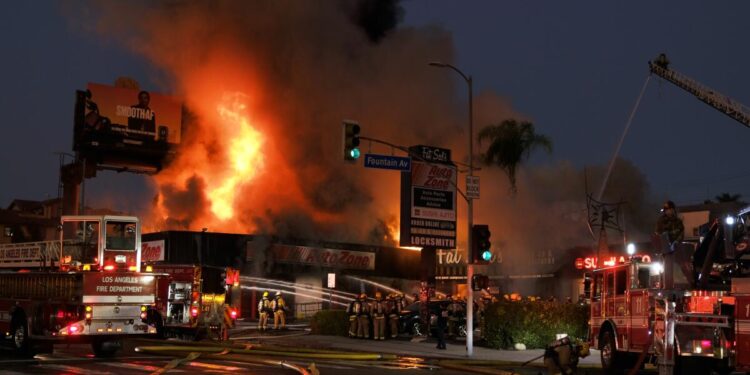 Fire rips through Hollywood auto parts store