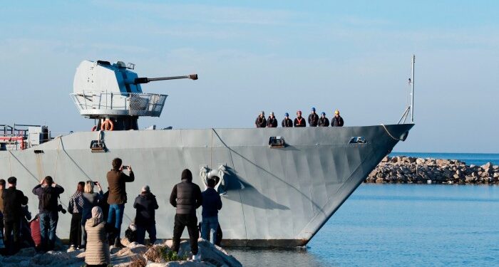 The Italian navy ship Libra arrives at the port of Shengjin, Albania, on Friday, with the second group of migrants