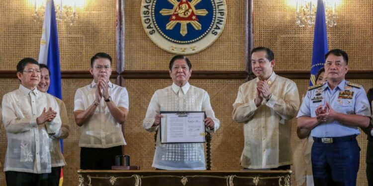 Marcos signs 2 key sea laws