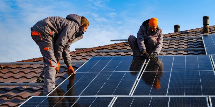 solar-panel-installation-2070531521-AlyoshinE-via-Shutterstock