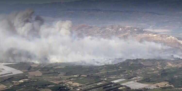 Mountain fire fouls the air, forcing a wood-burning ban just as fall cooldown begins