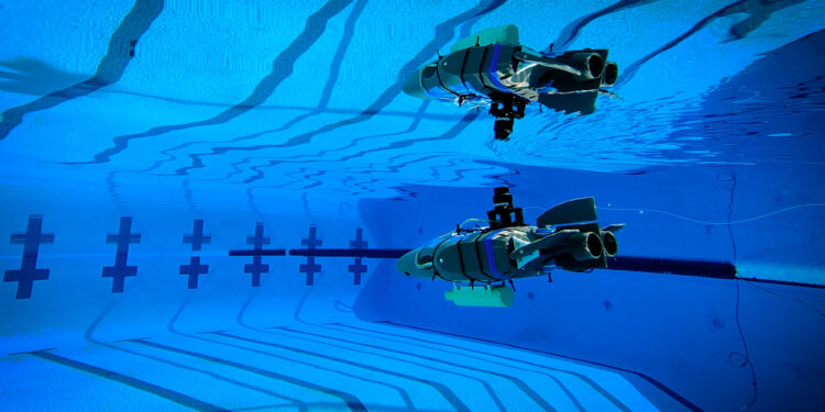 A robot underwater in a swimming pool