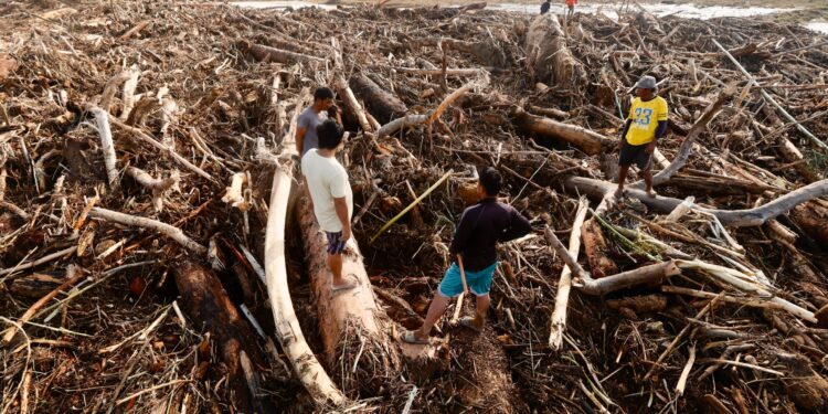 Photos: New storm bears down on the Philippines after typhoon wrecks havoc