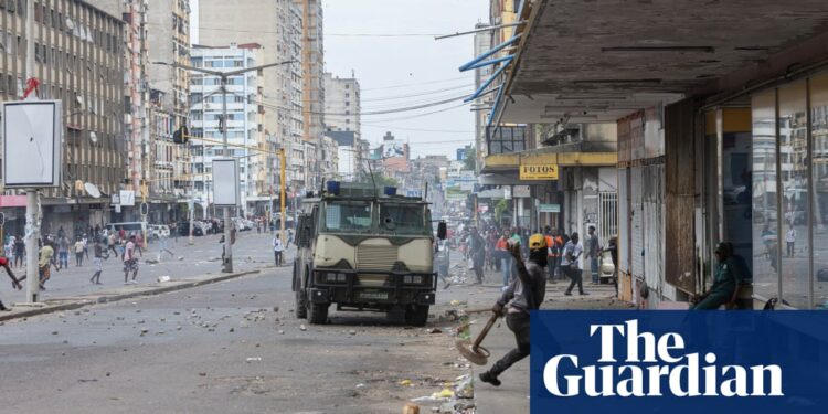 Protesters help woman mown down by military vehicle in Mozambique – video