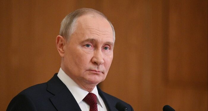 A headshot of Vladimir Putin