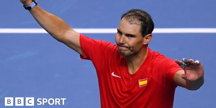 Rafael Nadal waves to the Davis Cup crowd in Malaga