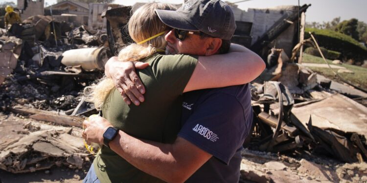 Southern California wildfire destroys 132 structures as officials look for fierce winds to subside