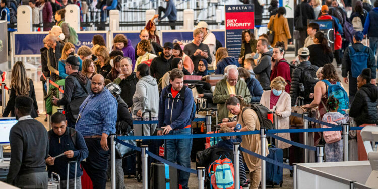 Thanksgiving Day storm batters Northeast with rain and snow, delaying travel