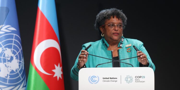 Mia Amor Mottley, the prime minister of Barbados, delivers a speech during the second day of the United Nations COP29 climate summit in Baku, Azerbaijan. Mottley is among several world leaders pushing for a tax on high-emitting industries like shipping and aviation.